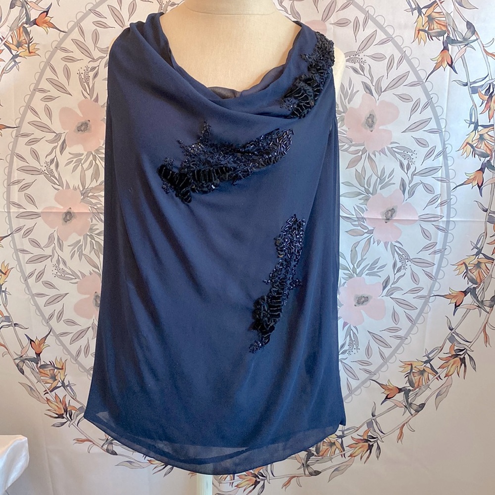 Size petite, blue sleeveless blouse with sequin designs